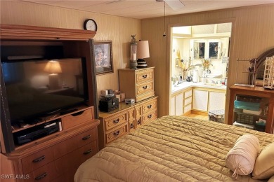 A nice-sized example of well cared for home in the premier on Six Lakes Country Club in Florida - for sale on GolfHomes.com, golf home, golf lot