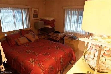 A nice-sized example of well cared for home in the premier on Six Lakes Country Club in Florida - for sale on GolfHomes.com, golf home, golf lot