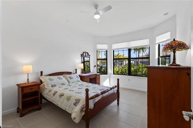 THIS HOME CHECKS OFF THE BOXES - POOL, GOLF COURSE AND WATER on Panther Run Golf Club in Florida - for sale on GolfHomes.com, golf home, golf lot