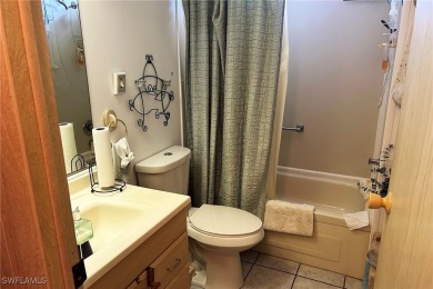 A nice-sized example of well cared for home in the premier on Six Lakes Country Club in Florida - for sale on GolfHomes.com, golf home, golf lot