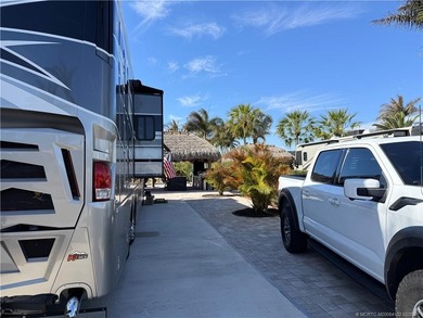 Perfectly positioned within a prestigious Class A-only resort on St. Lucie Trail Golf Club in Florida - for sale on GolfHomes.com, golf home, golf lot
