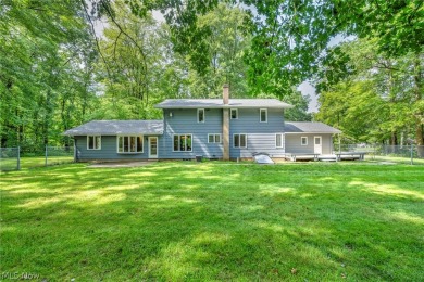 This spacious 5-bedroom, 3.5-bath home sits on 1.74 acres and on Windmill Lakes Golf Club in Ohio - for sale on GolfHomes.com, golf home, golf lot