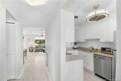 Peaceful and tranquil living comes to mind when you enter this on Miles Grant Country Club in Florida - for sale on GolfHomes.com, golf home, golf lot