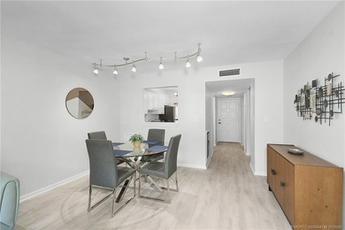 Peaceful and tranquil living comes to mind when you enter this on Miles Grant Country Club in Florida - for sale on GolfHomes.com, golf home, golf lot