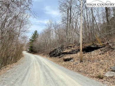 Beautiful sloping vacant lot located in the sought after on Beech Mountain Club in North Carolina - for sale on GolfHomes.com, golf home, golf lot