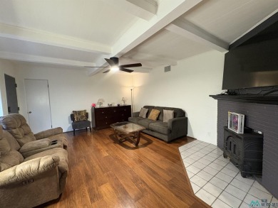 Experience the perfect blend of comfort and elegance in this on Spring River Golf Course in New Mexico - for sale on GolfHomes.com, golf home, golf lot