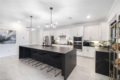 Step into resort-style living in this beautifully appointed on Old Corkscrew Golf Club in Florida - for sale on GolfHomes.com, golf home, golf lot