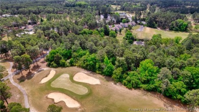 Build your dream home on this .74 acre, corner lot located on on Foxfire Golf and Country Club in North Carolina - for sale on GolfHomes.com, golf home, golf lot