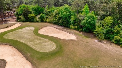 Build your dream home on this .74 acre, corner lot located on on Foxfire Golf and Country Club in North Carolina - for sale on GolfHomes.com, golf home, golf lot