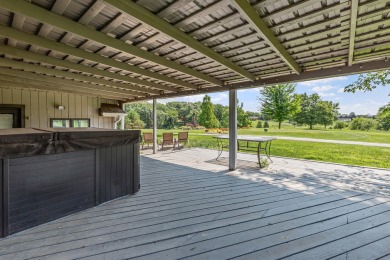 This 5-bedroom, 23/4-bath, 4,000 sq ft home is the ultimate on Lake of Four Seasons Country Club in Indiana - for sale on GolfHomes.com, golf home, golf lot