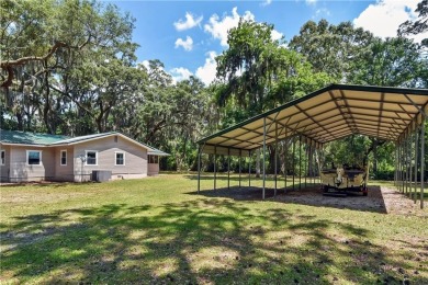 Nestled in the heart of Shellman Bluff, this two bedroom/two on Sapelo Hammock Golf Club in Georgia - for sale on GolfHomes.com, golf home, golf lot