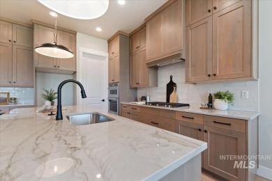 This beautifully designed modern farmhouse backs up to the golf on Falcon Crest Golf Club in Idaho - for sale on GolfHomes.com, golf home, golf lot