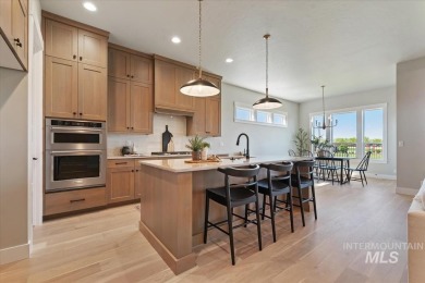 This beautifully designed modern farmhouse backs up to the golf on Falcon Crest Golf Club in Idaho - for sale on GolfHomes.com, golf home, golf lot