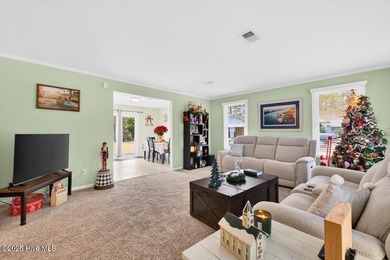 This charming 3-bedroom, 2-bath home is perfectly situated on a on Carolina Shores Golf Course in North Carolina - for sale on GolfHomes.com, golf home, golf lot