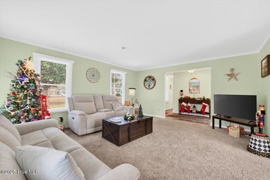 This charming 3-bedroom, 2-bath home is perfectly situated on a on Carolina Shores Golf Course in North Carolina - for sale on GolfHomes.com, golf home, golf lot