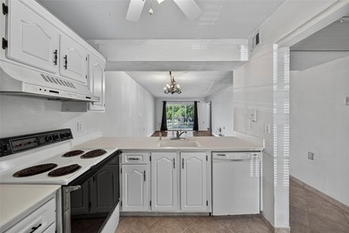 GREAT VALUE!!! LOWEST PRICED IN WYNMOOR, NO UPCOMING ASSESMENT! on Wynmoor Golf Course in Florida - for sale on GolfHomes.com, golf home, golf lot