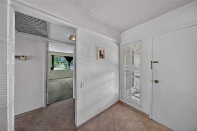 GREAT VALUE!!! 
LOWEST PRICED IN WYNMOOR, PRICED TO SELL AS on Wynmoor Golf Course in Florida - for sale on GolfHomes.com, golf home, golf lot