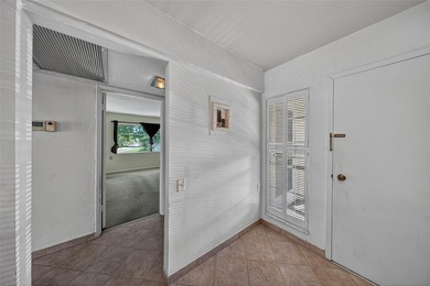 GREAT VALUE!!! LOWEST PRICED IN WYNMOOR, NO UPCOMING ASSESMENT! on Wynmoor Golf Course in Florida - for sale on GolfHomes.com, golf home, golf lot