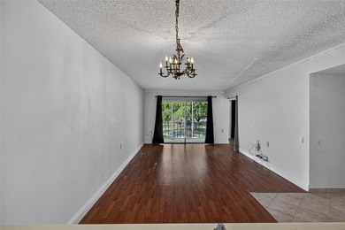 GREAT VALUE!!! LOWEST PRICED IN WYNMOOR, NO UPCOMING ASSESMENT! on Wynmoor Golf Course in Florida - for sale on GolfHomes.com, golf home, golf lot