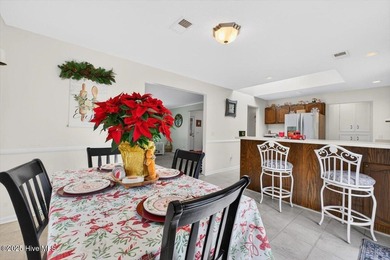 This charming 3-bedroom, 2-bath home is perfectly situated on a on Carolina Shores Golf Course in North Carolina - for sale on GolfHomes.com, golf home, golf lot