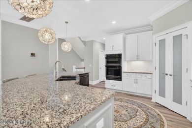 Welcome to your immaculate luxury Eastwood Bluffs townhome on Sea Trail Golf Resort in North Carolina - for sale on GolfHomes.com, golf home, golf lot