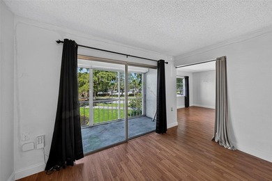 GREAT VALUE!!! LOWEST PRICED IN WYNMOOR, NO UPCOMING ASSESMENT! on Wynmoor Golf Course in Florida - for sale on GolfHomes.com, golf home, golf lot