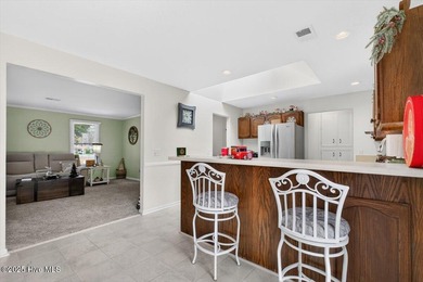 This charming 3-bedroom, 2-bath home is perfectly situated on a on Carolina Shores Golf Course in North Carolina - for sale on GolfHomes.com, golf home, golf lot