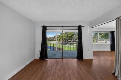 GREAT VALUE!!! LOWEST PRICED IN WYNMOOR, NO UPCOMING ASSESMENT! on Wynmoor Golf Course in Florida - for sale on GolfHomes.com, golf home, golf lot