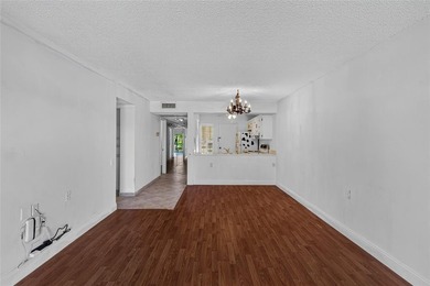 GREAT VALUE!!! 
LOWEST PRICED IN WYNMOOR, PRICED TO SELL AS on Wynmoor Golf Course in Florida - for sale on GolfHomes.com, golf home, golf lot