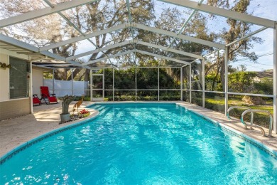 Embrace the essence of living the Florida Dream in this stunning on The Dunedin Country Club in Florida - for sale on GolfHomes.com, golf home, golf lot