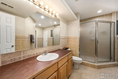 Experience luxury main floor living, with three bedrooms, an on The Olde Course At Loveland in Colorado - for sale on GolfHomes.com, golf home, golf lot