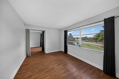 GREAT VALUE!!! 
LOWEST PRICED IN WYNMOOR, PRICED TO SELL AS on Wynmoor Golf Course in Florida - for sale on GolfHomes.com, golf home, golf lot