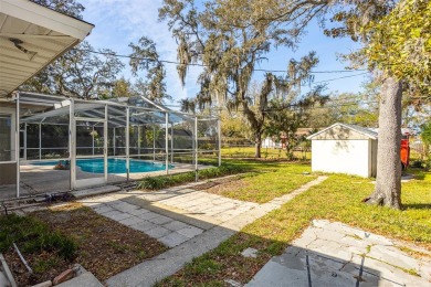 Embrace the essence of living the Florida Dream in this stunning on The Dunedin Country Club in Florida - for sale on GolfHomes.com, golf home, golf lot