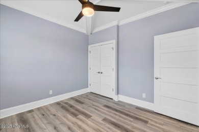 Welcome to your immaculate luxury Eastwood Bluffs townhome on Sea Trail Golf Resort in North Carolina - for sale on GolfHomes.com, golf home, golf lot