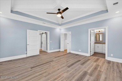 Welcome to your immaculate luxury Eastwood Bluffs townhome on Sea Trail Golf Resort in North Carolina - for sale on GolfHomes.com, golf home, golf lot