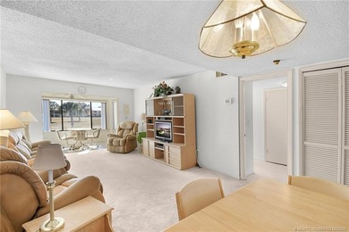 Second Floor 1/1.5 Condo with golf course views in Miles Grant on Miles Grant Country Club in Florida - for sale on GolfHomes.com, golf home, golf lot