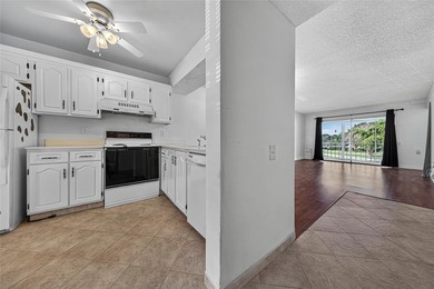 GREAT VALUE!!! 
LOWEST PRICED IN WYNMOOR, PRICED TO SELL AS on Wynmoor Golf Course in Florida - for sale on GolfHomes.com, golf home, golf lot