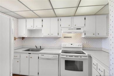 Second Floor 1/1.5 Condo with golf course views in Miles Grant on Miles Grant Country Club in Florida - for sale on GolfHomes.com, golf home, golf lot