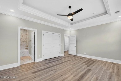 Welcome to your immaculate luxury Eastwood Bluffs townhome on Sea Trail Golf Resort in North Carolina - for sale on GolfHomes.com, golf home, golf lot