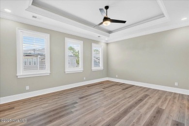 Welcome to your immaculate luxury Eastwood Bluffs townhome on Sea Trail Golf Resort in North Carolina - for sale on GolfHomes.com, golf home, golf lot