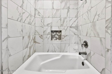 Welcome to your immaculate luxury Eastwood Bluffs townhome on Sea Trail Golf Resort in North Carolina - for sale on GolfHomes.com, golf home, golf lot