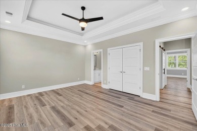 Welcome to your immaculate luxury Eastwood Bluffs townhome on Sea Trail Golf Resort in North Carolina - for sale on GolfHomes.com, golf home, golf lot