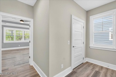 Welcome to your immaculate luxury Eastwood Bluffs townhome on Sea Trail Golf Resort in North Carolina - for sale on GolfHomes.com, golf home, golf lot