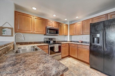 This beautifully appointed condo offers the perfect blend of on Dove Valley Ranch in Arizona - for sale on GolfHomes.com, golf home, golf lot