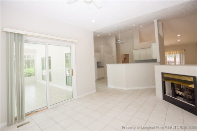 Nestled in the desirable Whispering Pines community and backing on Whispering Woods in North Carolina - for sale on GolfHomes.com, golf home, golf lot