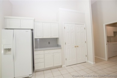 Nestled in the desirable Whispering Pines community and backing on Whispering Woods in North Carolina - for sale on GolfHomes.com, golf home, golf lot