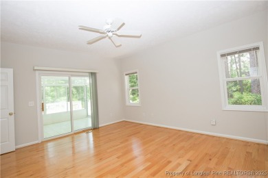 Nestled in the desirable Whispering Pines community and backing on Whispering Woods in North Carolina - for sale on GolfHomes.com, golf home, golf lot