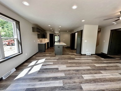 Est Date of Comp 6/1/25. You will not want to miss the on Two Oaks North Golf Course in Wisconsin - for sale on GolfHomes.com, golf home, golf lot