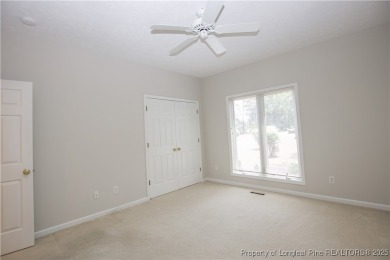 Nestled in the desirable Whispering Pines community and backing on Whispering Woods in North Carolina - for sale on GolfHomes.com, golf home, golf lot
