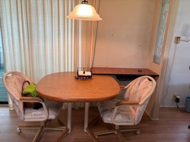 This home is in a 55 plus community with a monthly lot rent of on Crystal Lake Club in Florida - for sale on GolfHomes.com, golf home, golf lot